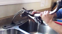 pull faucet out and clean sink